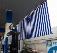 Bạt che nắng mưa  tự cuốn bằng lò xo